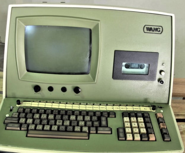 Old Classical Computer. Tape drive for data and integrated screen. Example of how long a bit has been used for